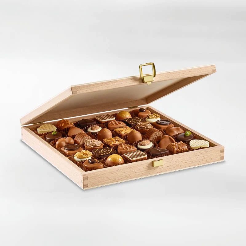 Läderach - Woodbox of 36 Assorted Praline Chocolates - Alissar Flowers Amman
